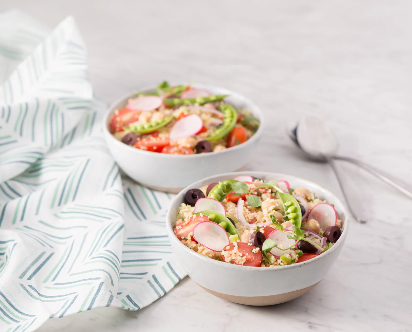 Fresh couscous salads with vegetables and herbs